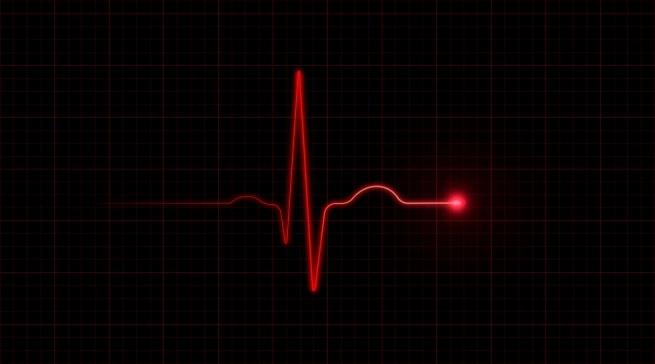 red heartbeat monitor line on a black background