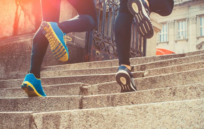 two runners ruunning up the stairs